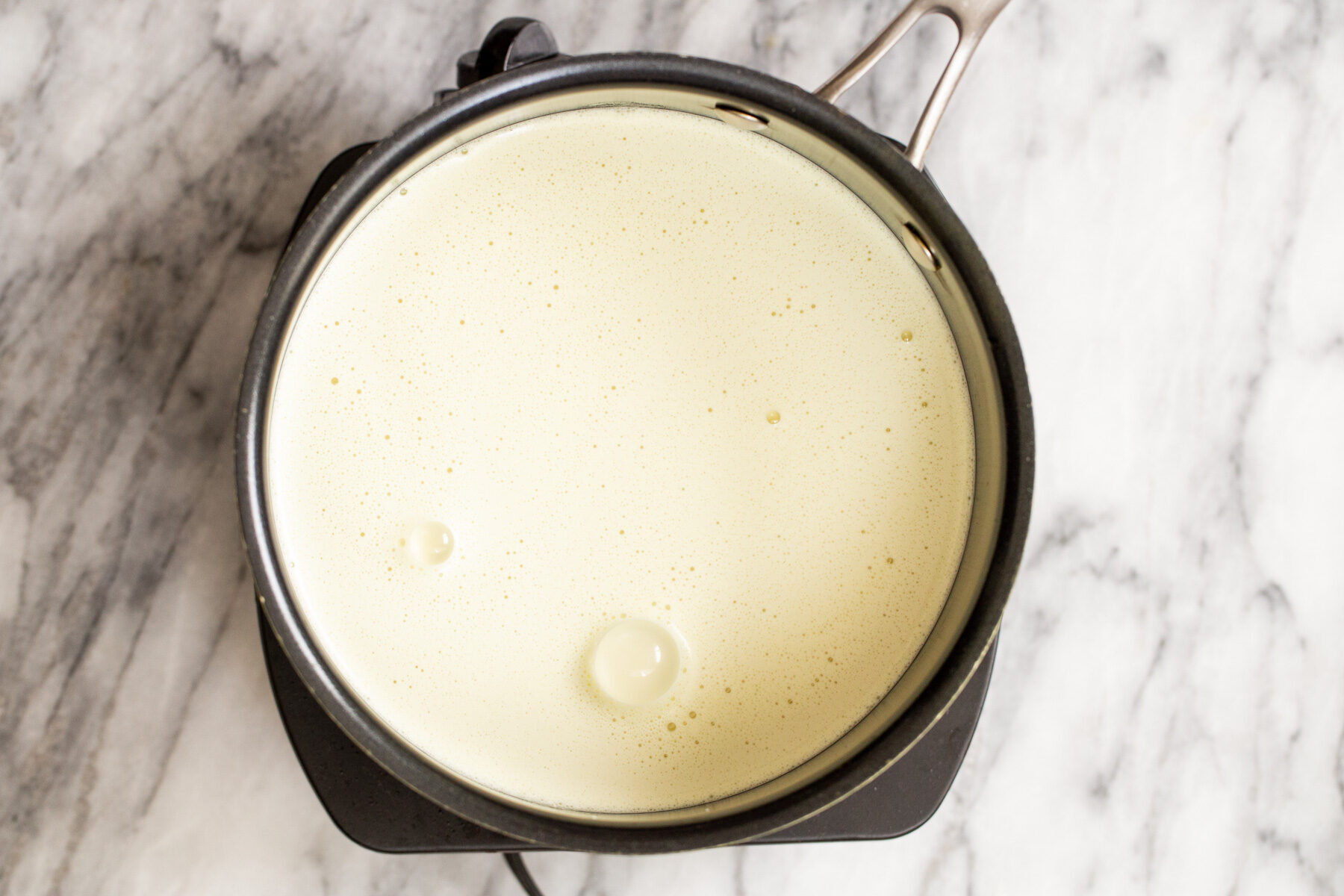 vegan custard ingredients in a saucepan