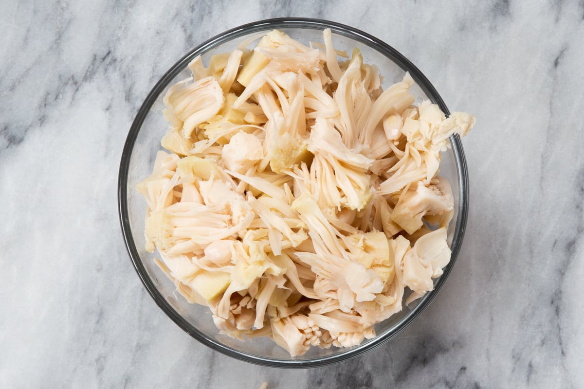 shredded jackfruit in a small glass bowl