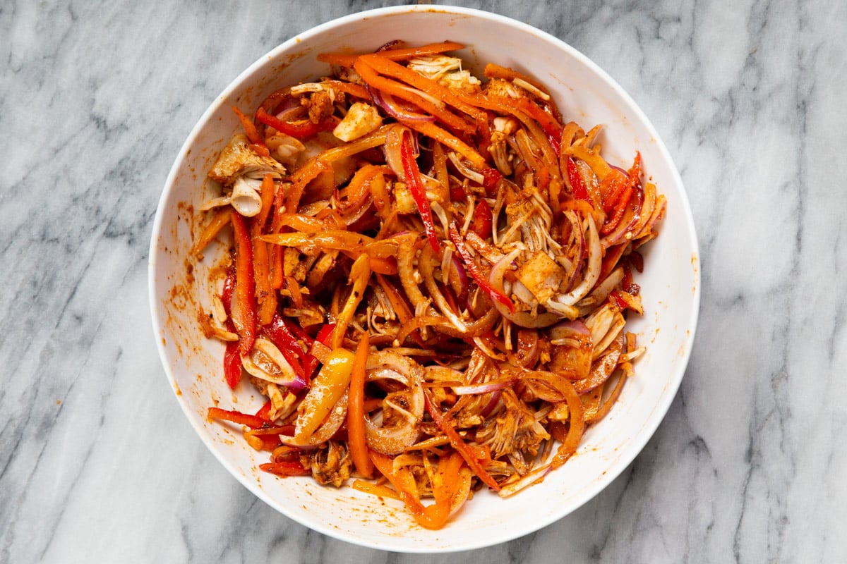 shredded jackfruit and veggies tossed with marinade ingredients