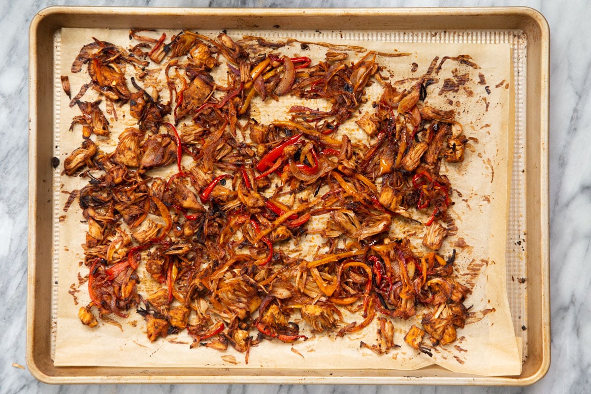 baked marinated jackfruit on a baking sheet