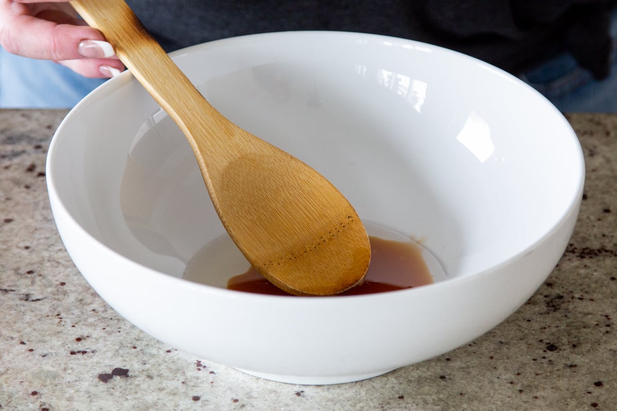 a white bowl with maple syrup and coconut oil