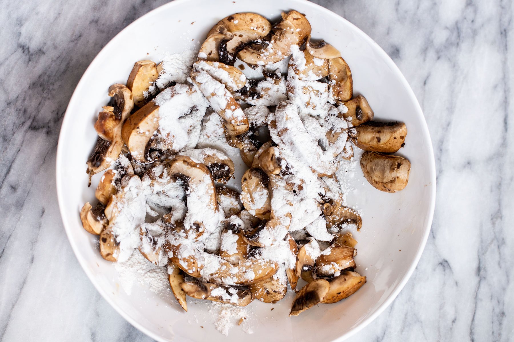sliced mushrooms tossed in cornstarch