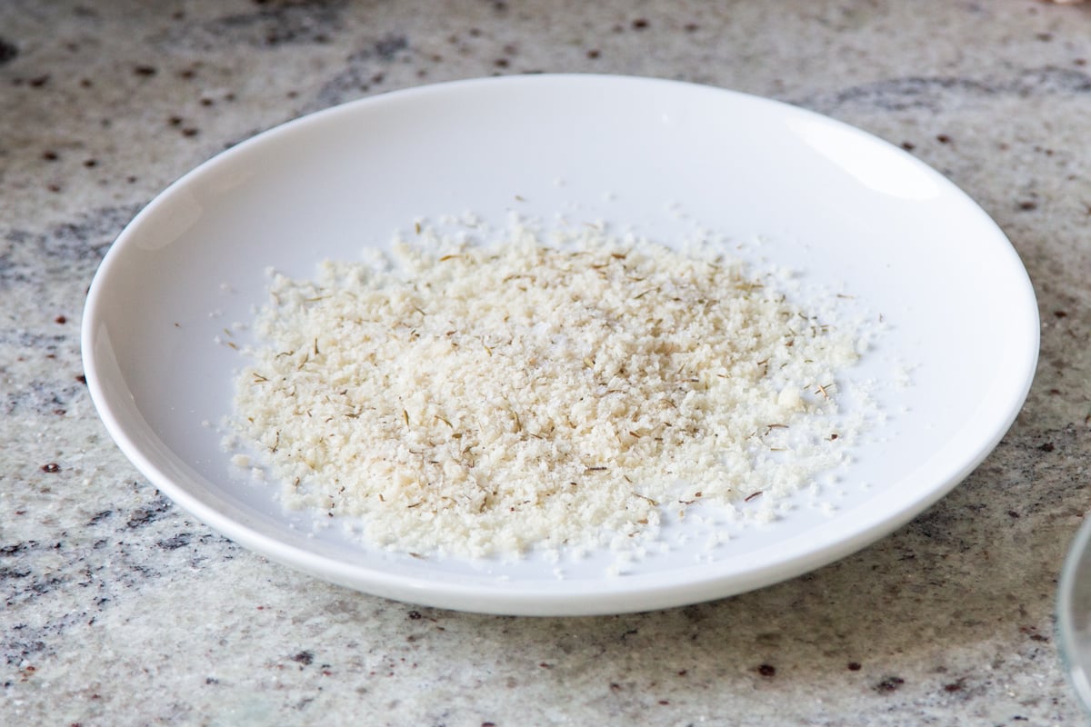coating for vegan cheese balls on a white plate 