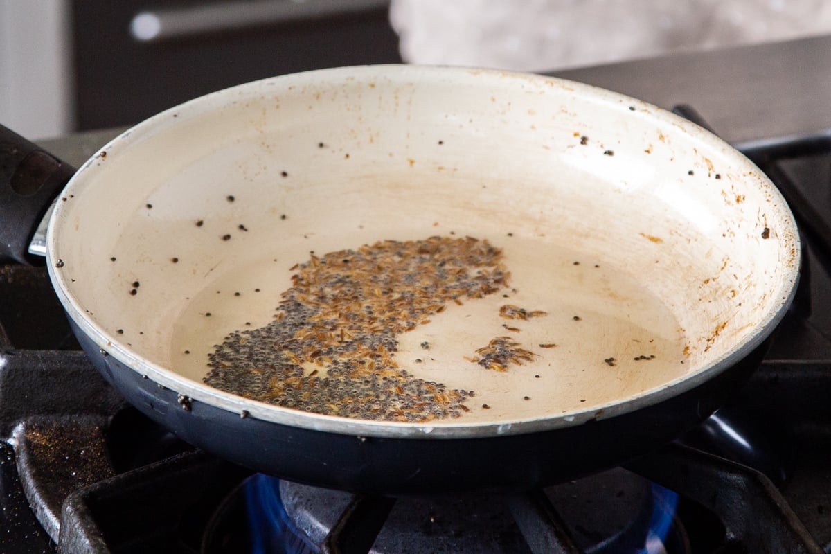 spices frying in a tempering