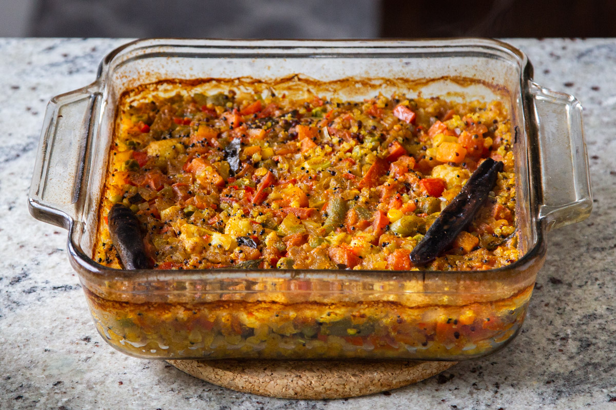 sambar baked in a glass casserole dish