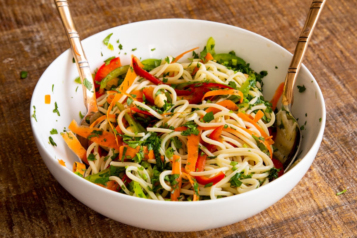 Mustard Chili Oil Tadka Spaghetti Salad Bowl in a white bowl