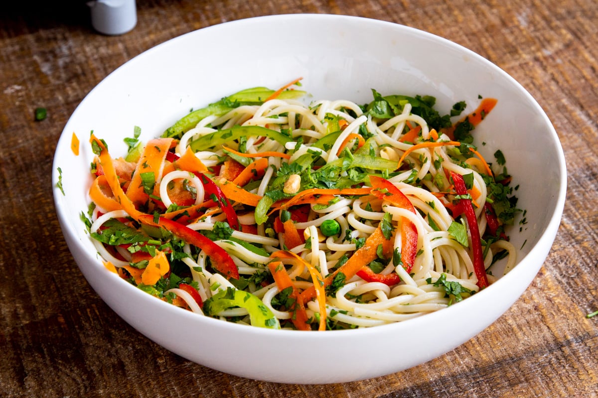 tadka spaghetti salad bowl sprinkled with herbs