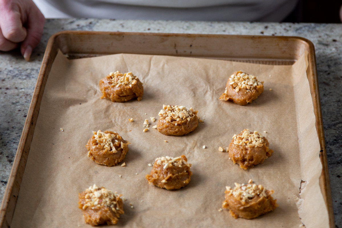 vegan no flour peanut butter cookies before baking on a cookie sheet