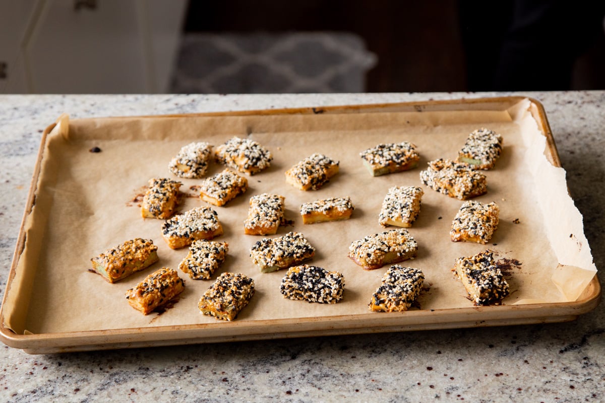 sesame crusted tofu on a baking sheet