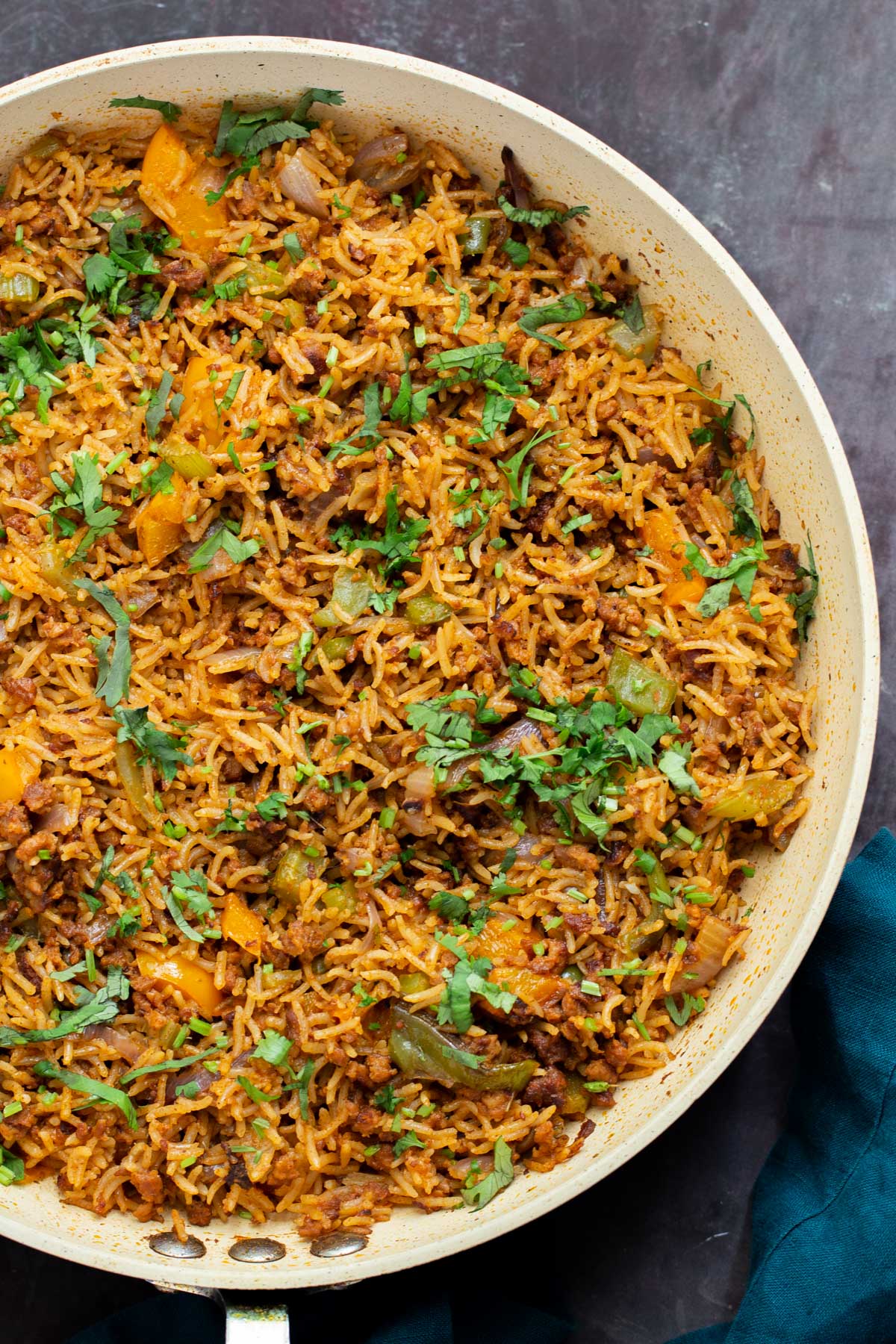a pan with vegan cajun rice topped with cilantro
