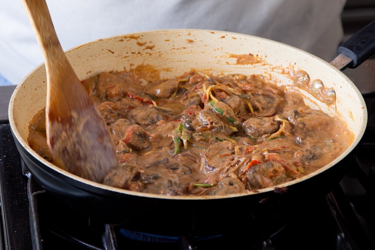 vegan mushroom patiala simmering in a saucepan