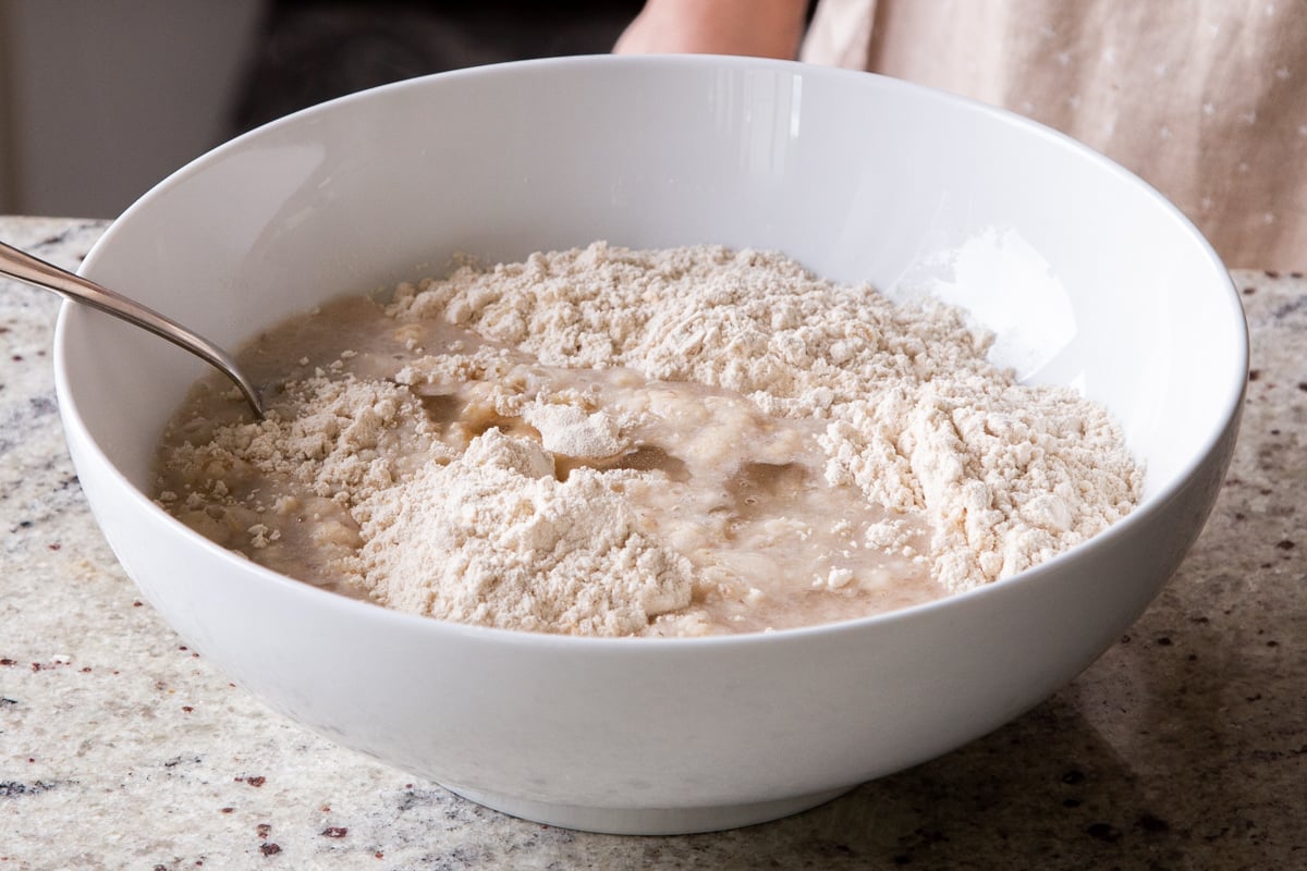 paratha dough after adding wet ingredients but before mixing and kneading