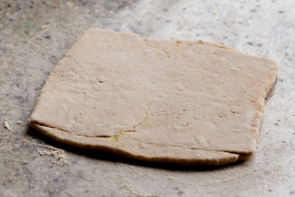 aloo paratha after folding and rolling out but before cooking
