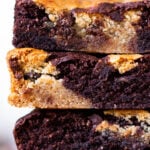 close-up of a stack of vegan brookie slices, so you can see the pretty, swirled inside