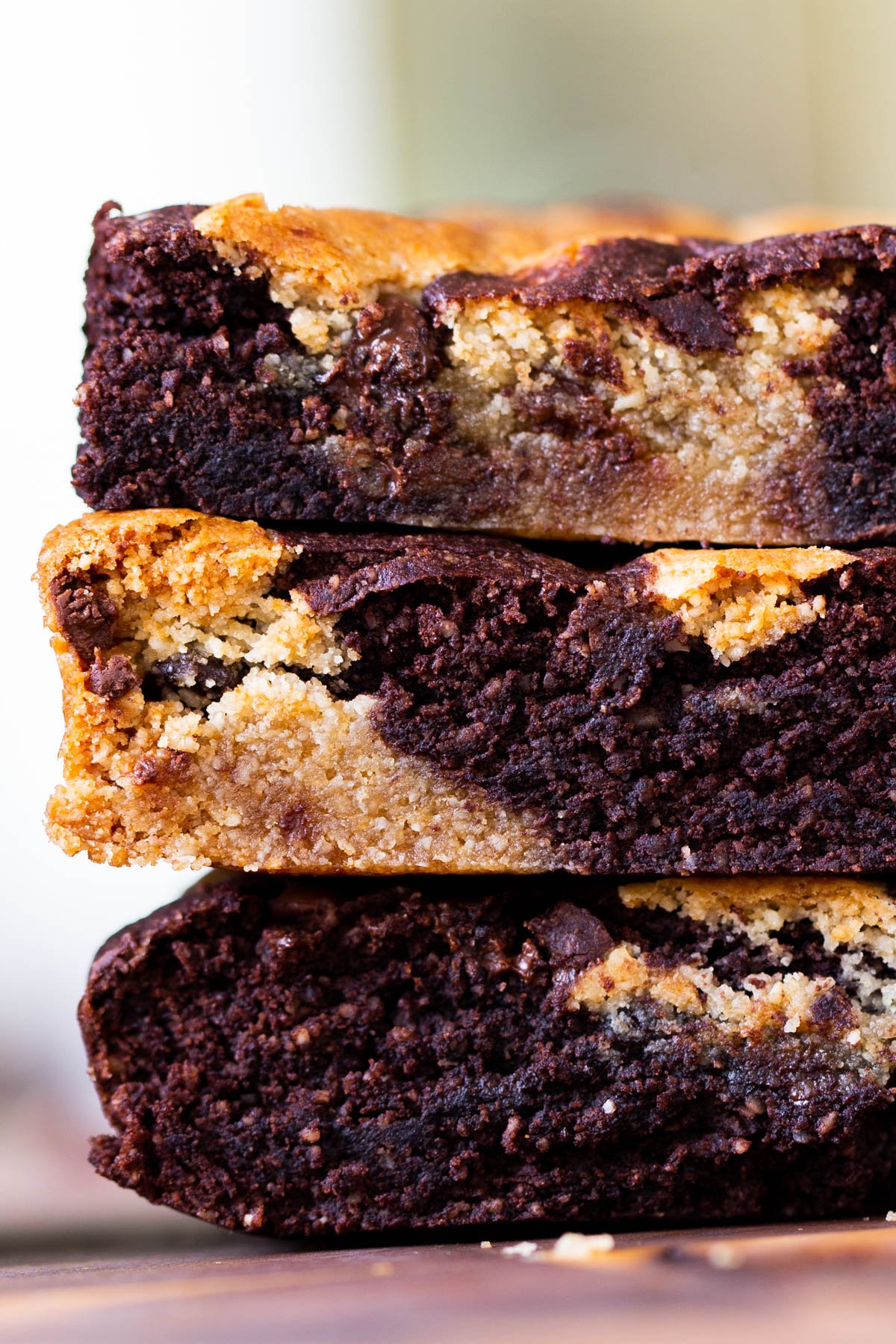 close-up of a stack of vegan brookie slices, so you can see the pretty, swirled inside
