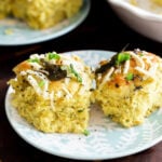 coconut dinner rolls on a plate