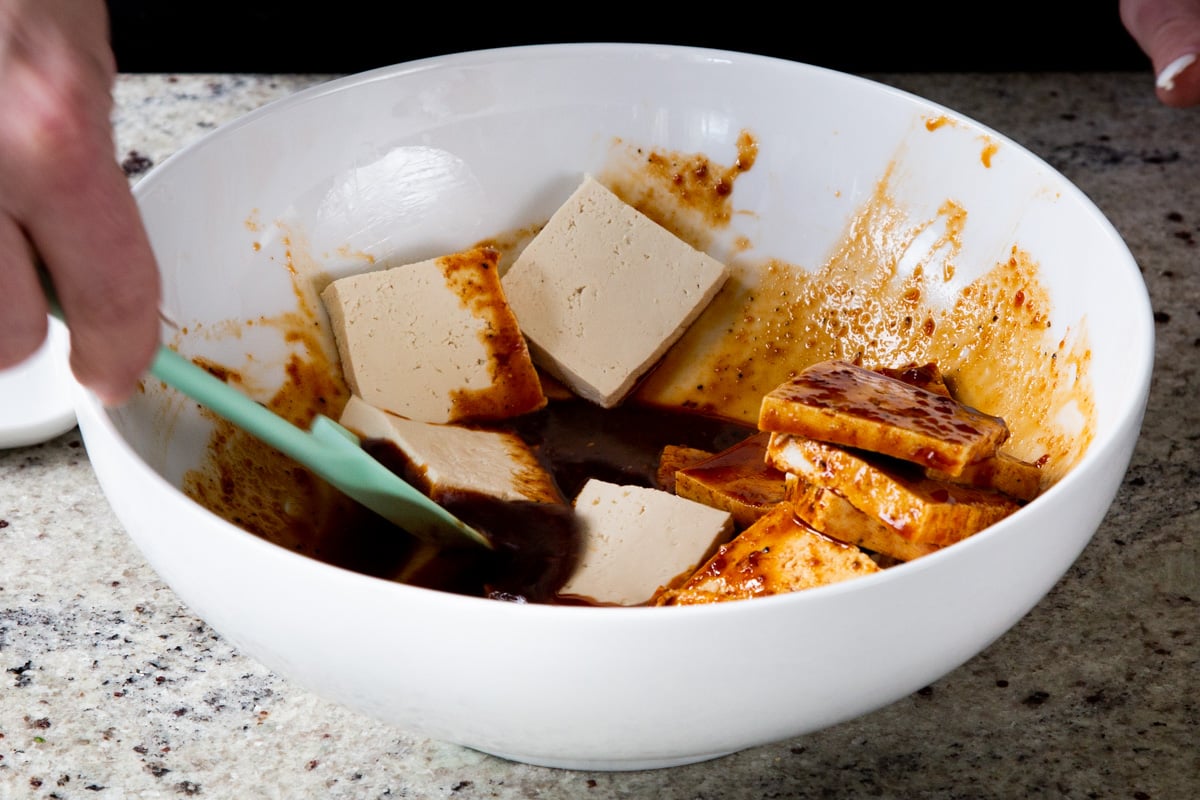 tofu added to the marinade, before mixing