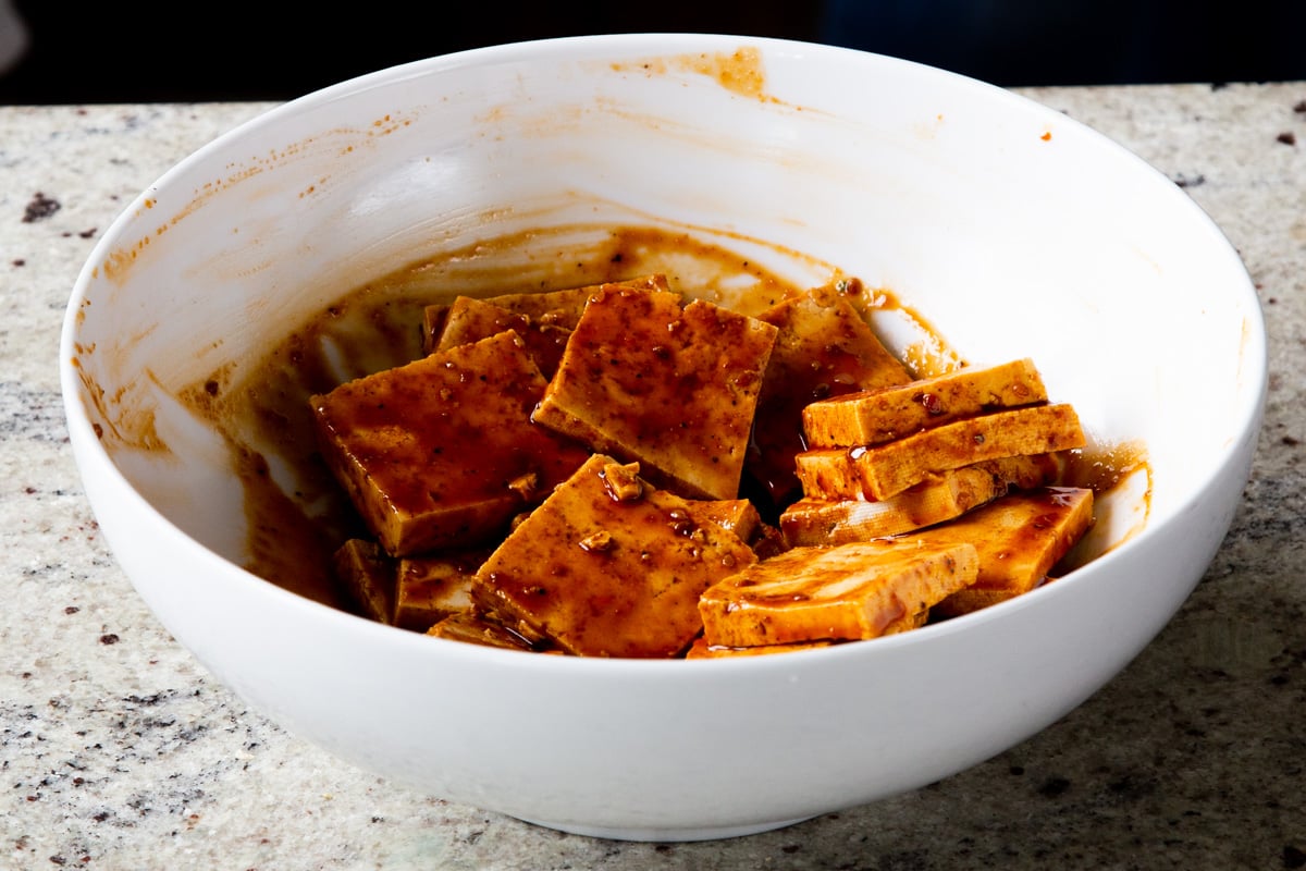 tofu added to the marinade, after mixing