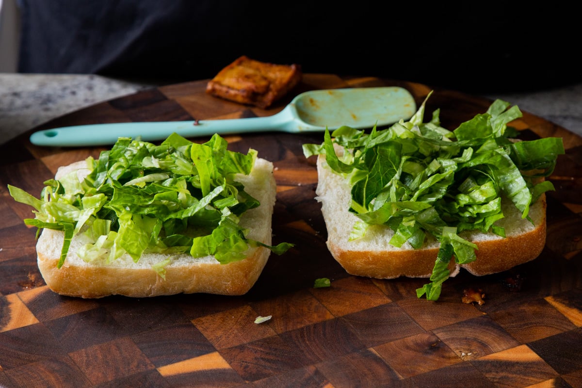 ciabatta rolls with lettuce on them
