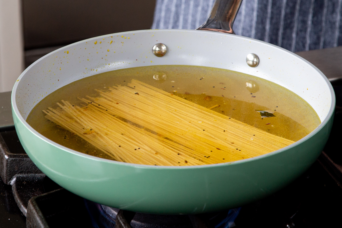 broth and noodles added to the pan of tempering, after removing the veggies