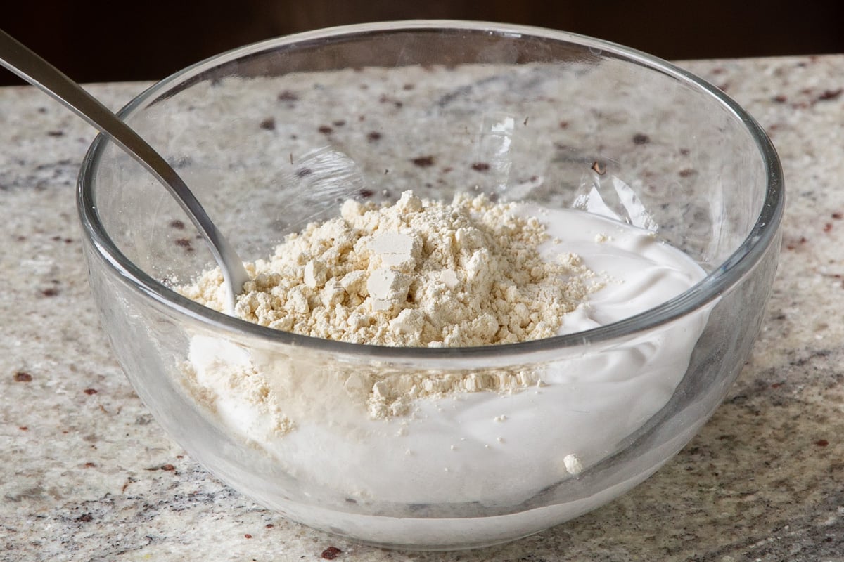 mixing non-dairy yogurt and chickpea flour