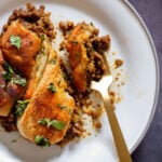 Lentil Keema Pav Casserole on the plate with a bite taken out