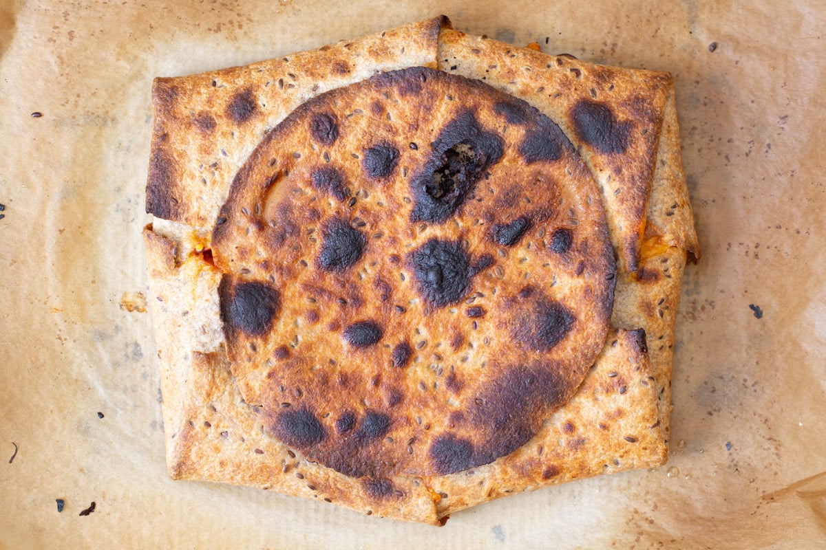 baked vegan pizza quesadilla before slicing