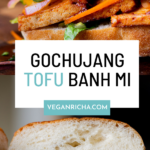 gochujang sandwich with pickled veggies on a wooden cutting board, text overlay