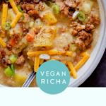 bowl of vegan potato soup with crumbled tofu, vegan cheese, and green onion on top, text overlay