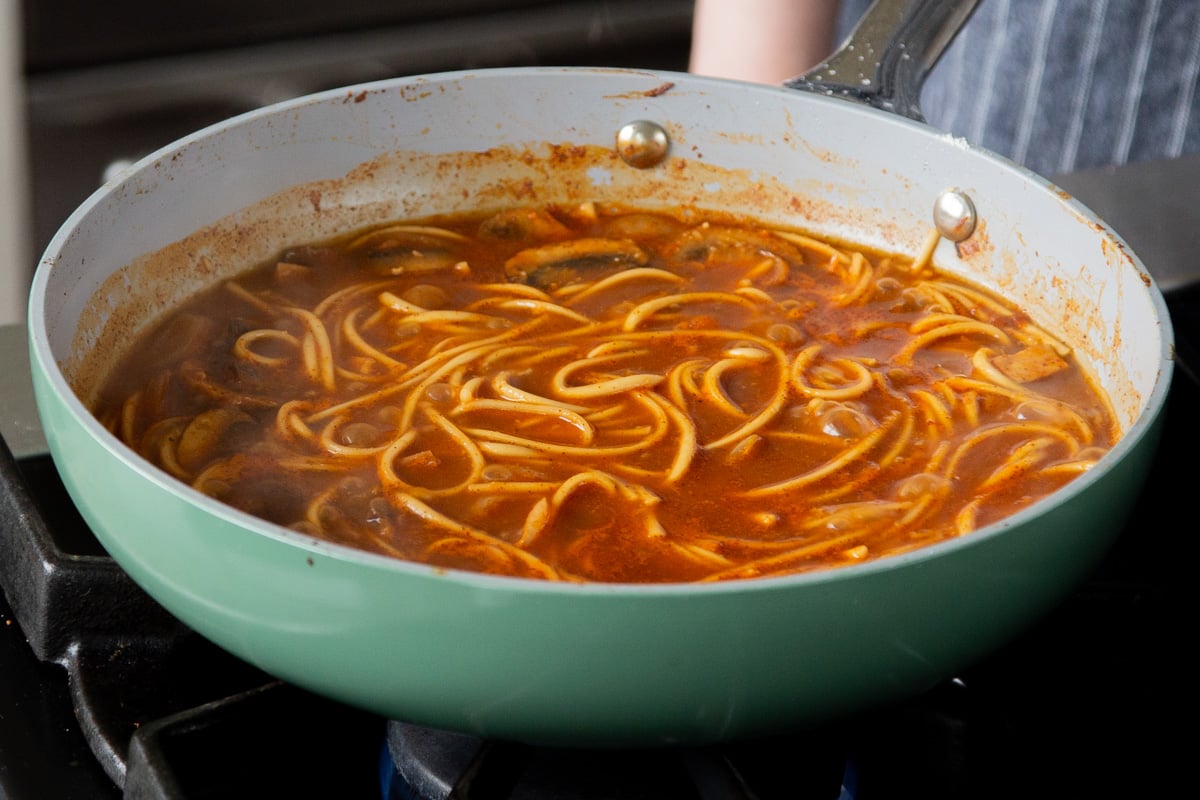 ramen in the birria broth, after cooking