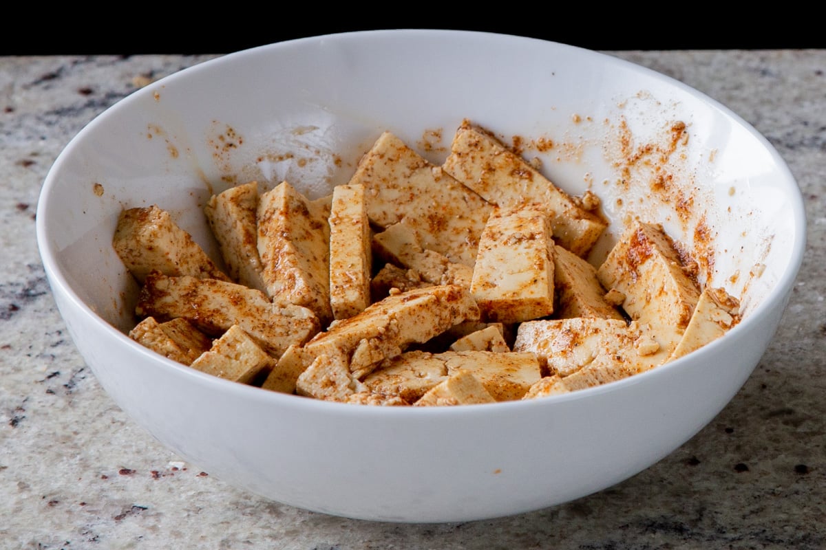 tofu pieces after mixing in the spices