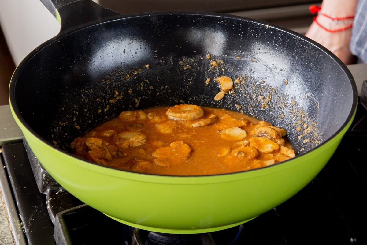 peanut butter mixture dissolved in hot water in the pan