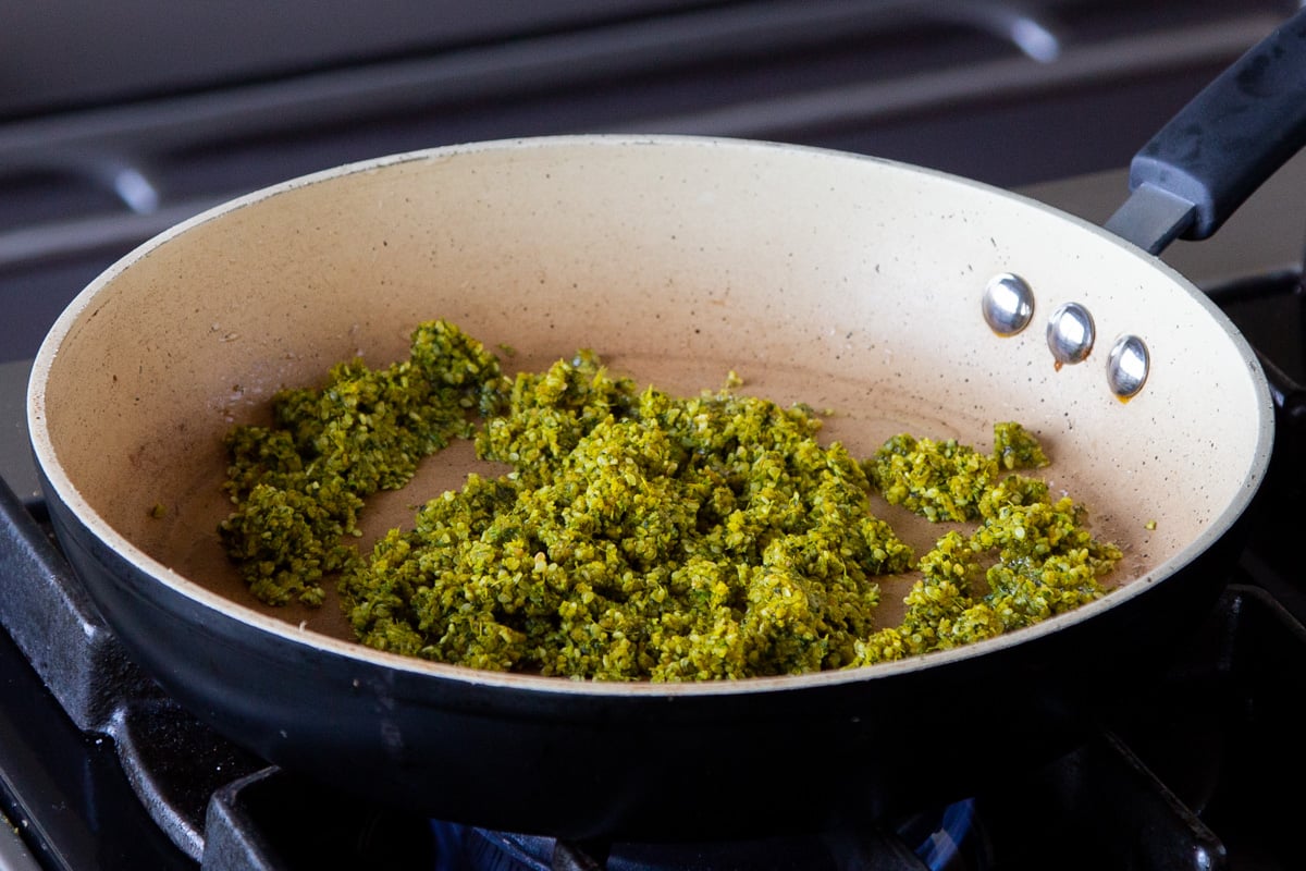 peanut-sesame seed-spice mixture in the frying pan