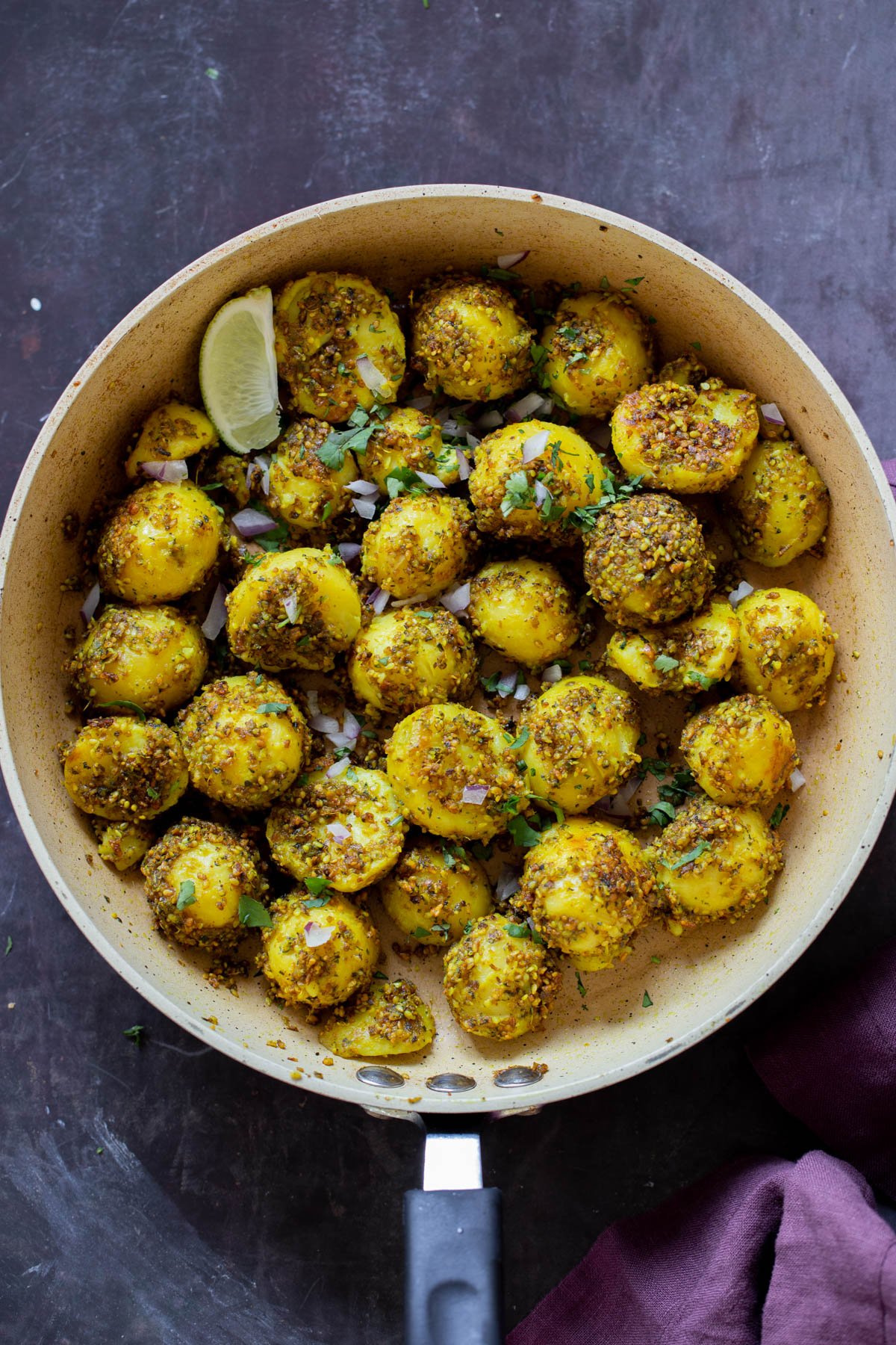 peanut sesame potatoes in the frying pan, after cooking