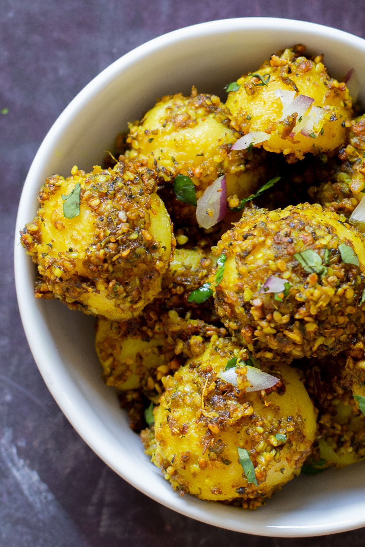 close-up of peanut sesame potatoes in a bowl, so you can see the texture