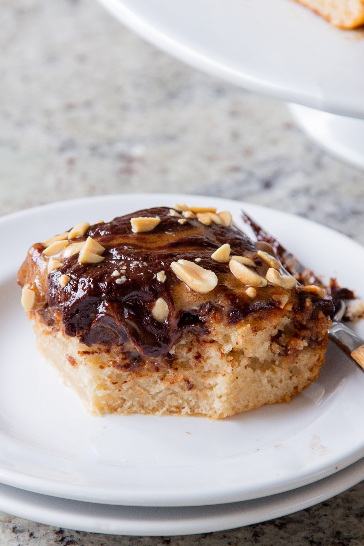 slices of Snickers cake with a bite taken out