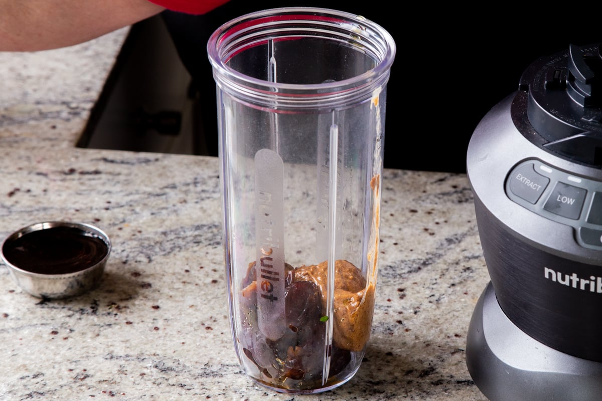 dates and almond butter in a blender