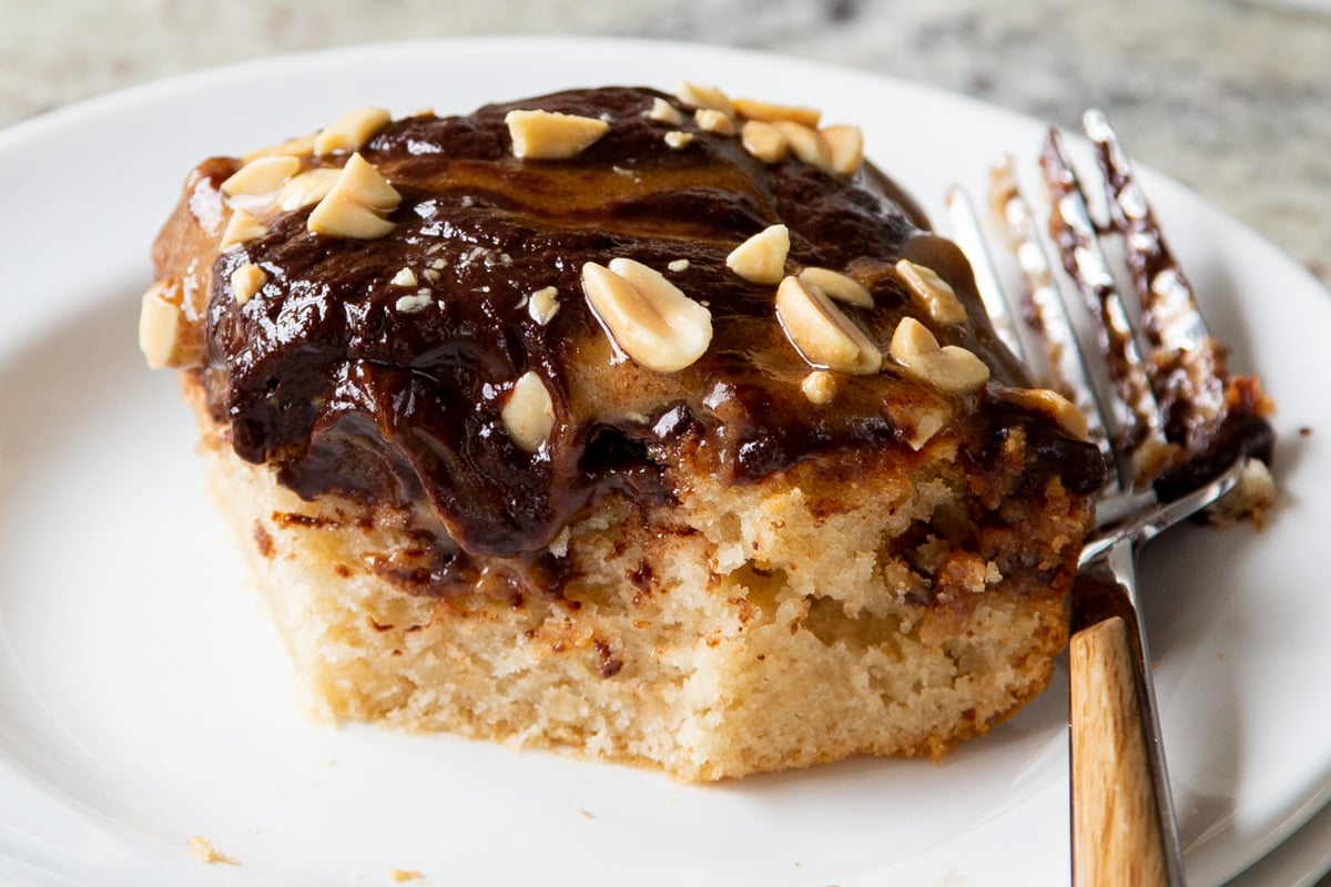 slices of Snickers cake with a bite taken out