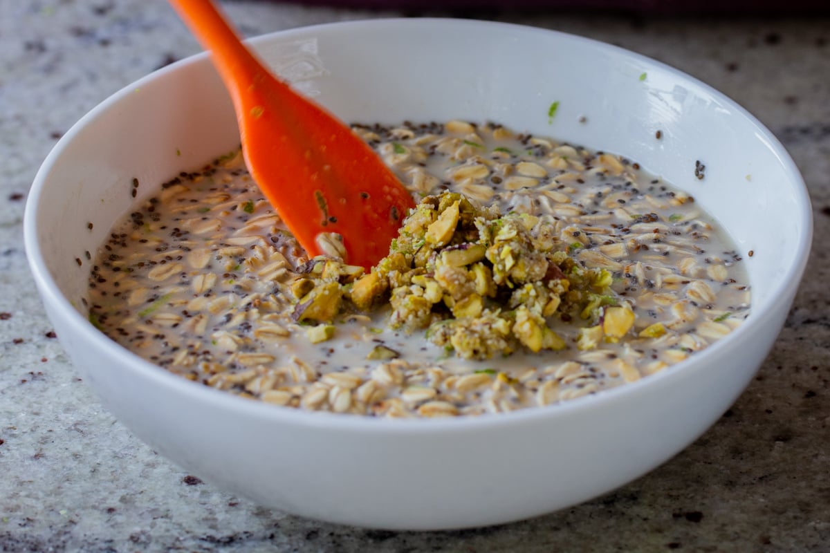 stirring some of the baklava nut mixture into the oat mixture