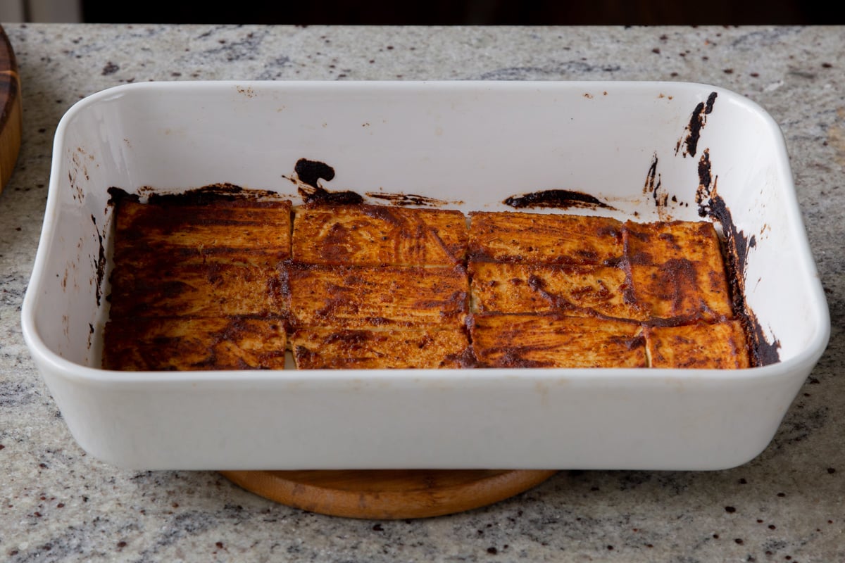 tofu deli slices in the pan after baking