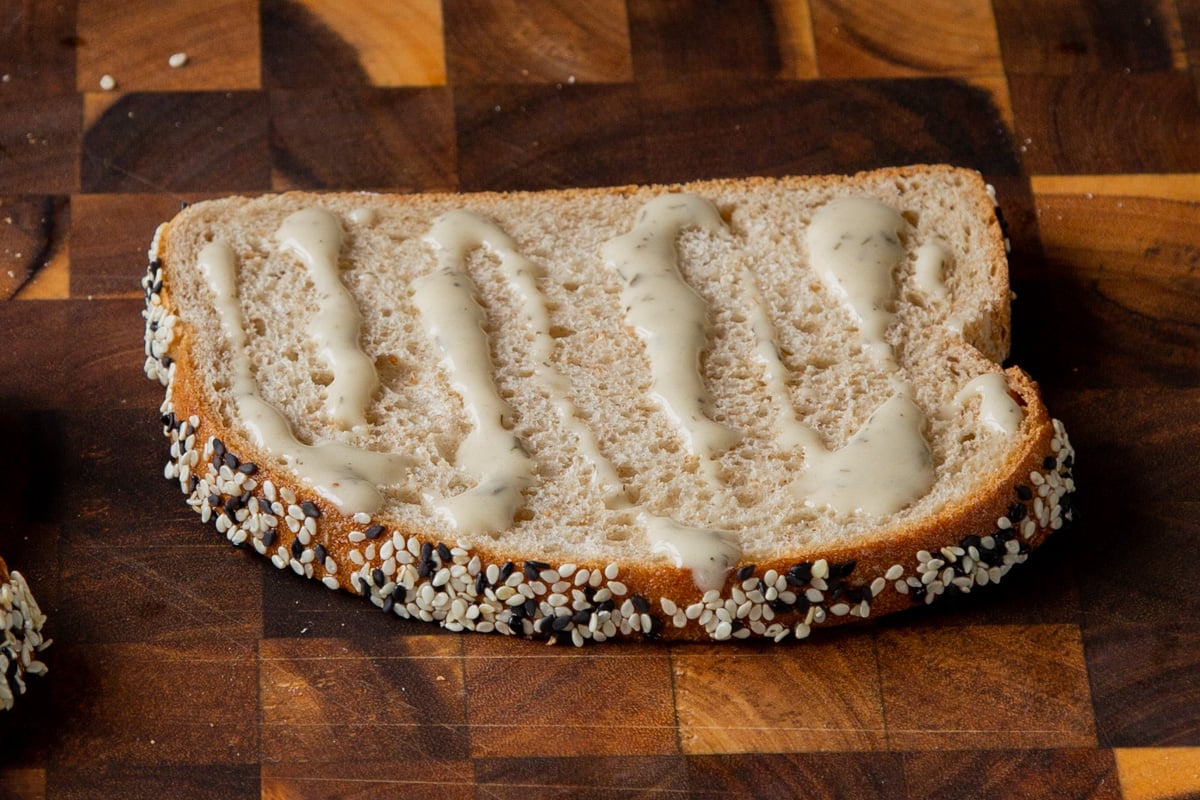 slice of bread with vegan mayo on it
