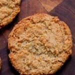 close-up of a vegan lemon cookie on a wooden table