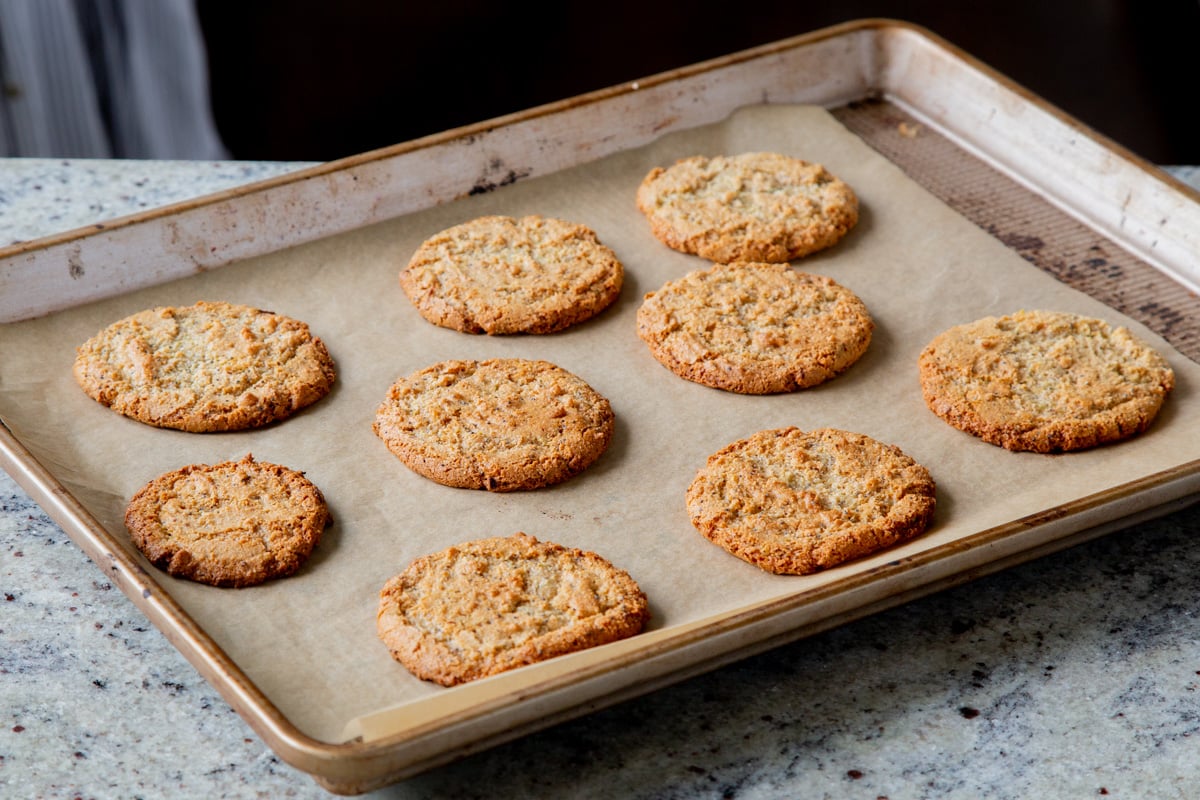 vegan lemon poppyseed cookies on the baking sheet, after baking