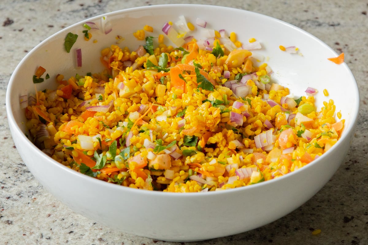 moong dal chaat salad in the mixing bowl, all tossed together