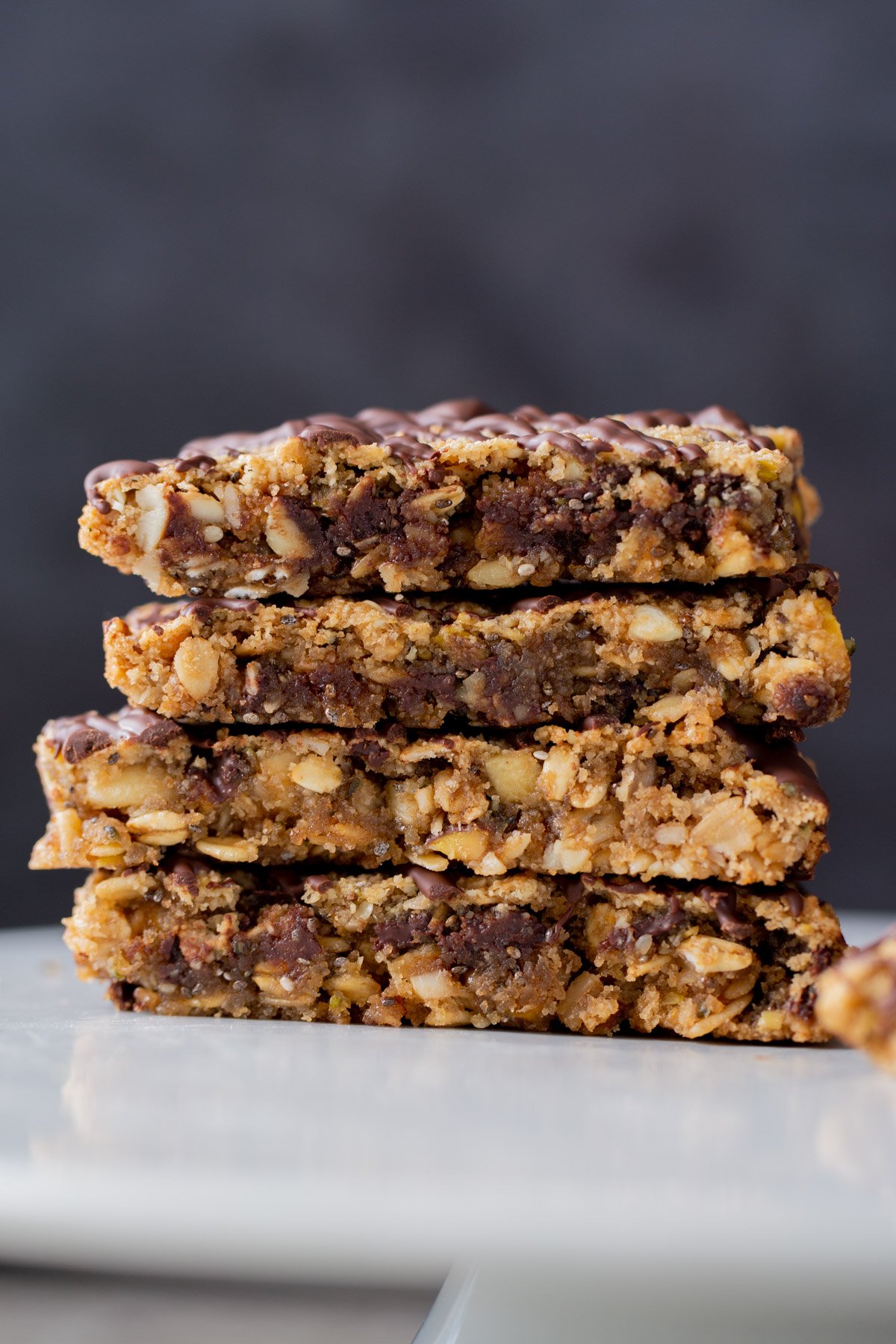 stack of crunchy granola bars, side shot, so you can see the texture inside