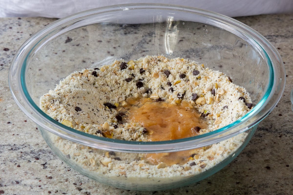adding wet ingredients to the mixed dry ingredients