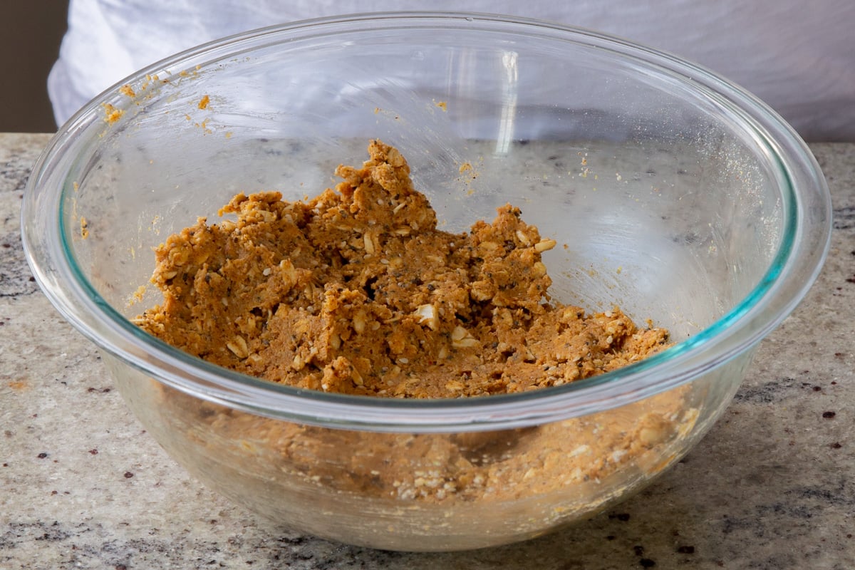 savory granola bar dough in the bowl after mixing