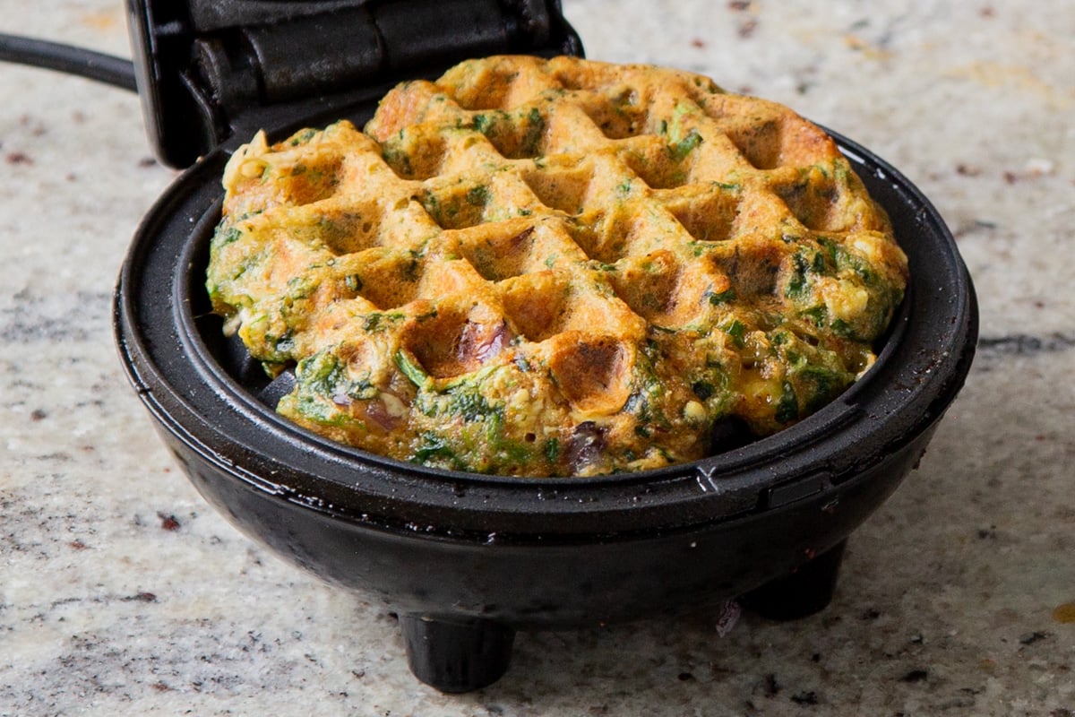 finished spinach waffle in then waffle maker
