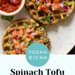 two spinach waffles on a plate topped with chopped tomato and cilantro with red dipping sauce next to them, text overlay