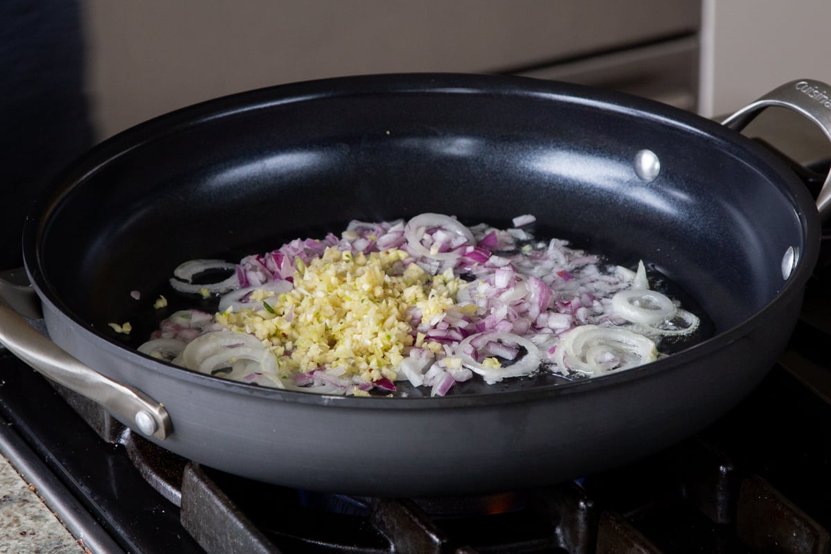 garlic and onions in the pan, before cooking